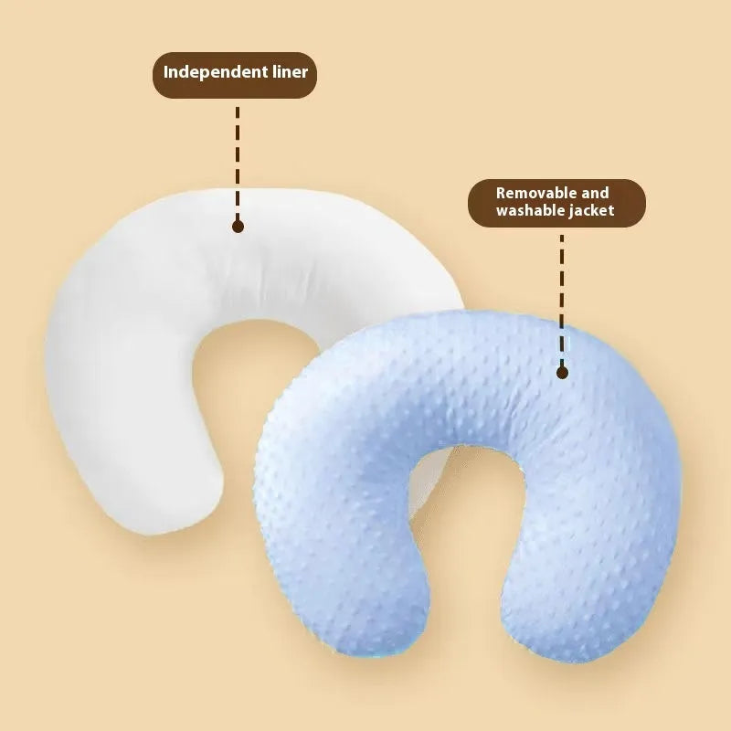 Split-shaped nursing pillow with removable cover in light blue colour for breastfeeding support and spill prevention