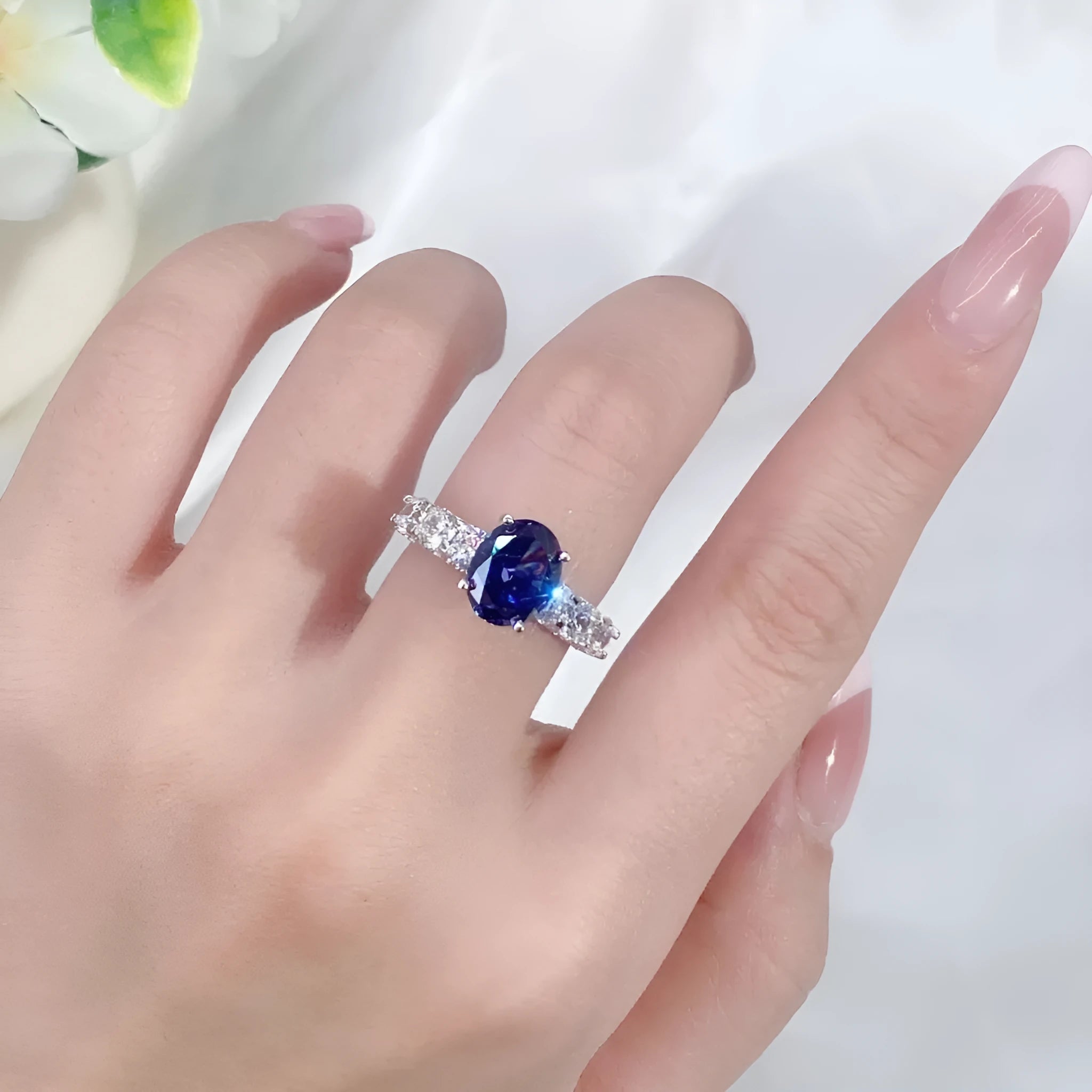 Heart-shaped sterling silver women's ring with an ice flower cut Tan Sang zircon.