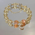 Citrine moon crystal bracelet with 14K gilded finish and diamond cut for women