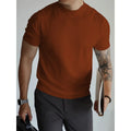 Men's solid colour slim-fit polyester T-shirt in dark gray, front view