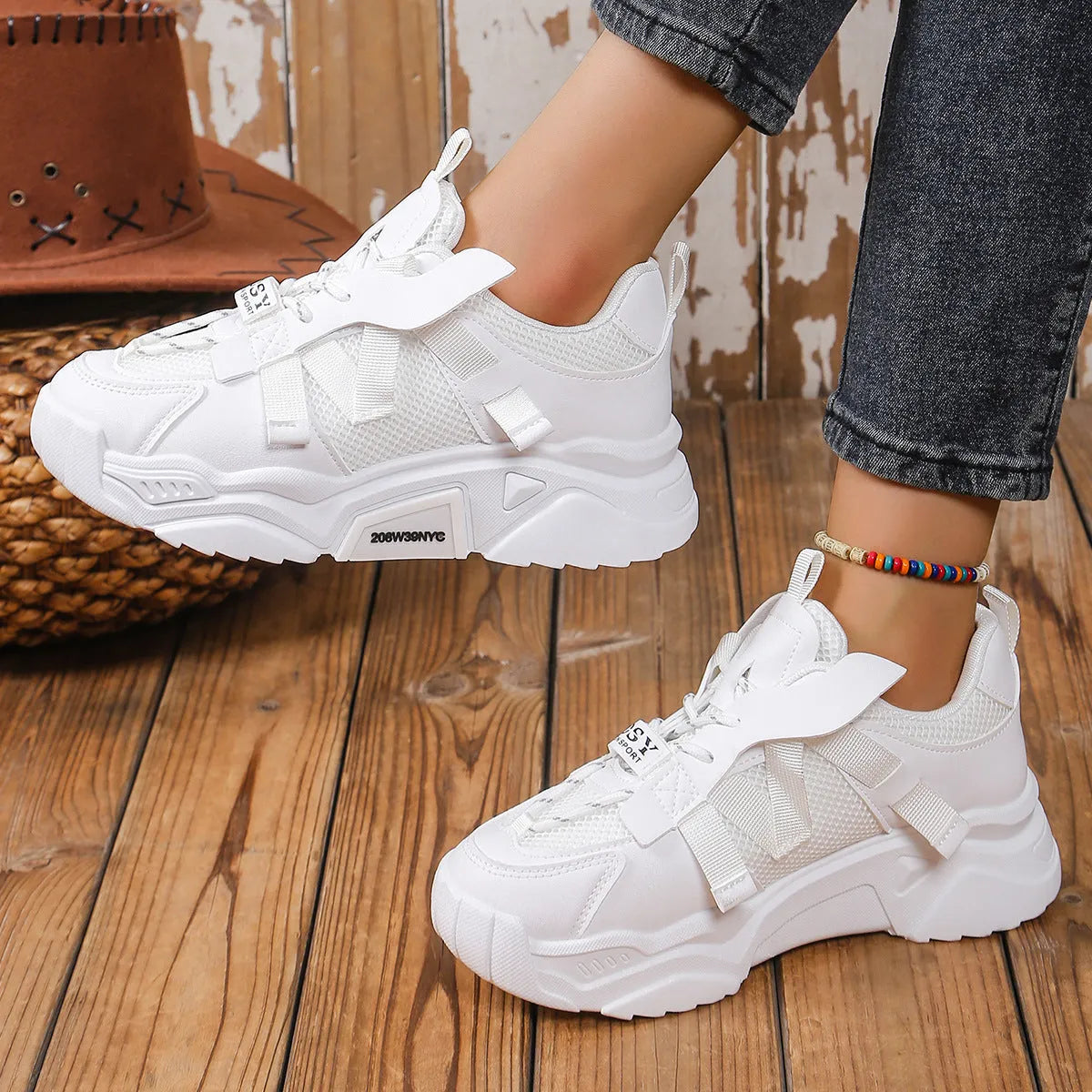 Women's purple platform mesh sports shoes with lace-up front and patterned sole