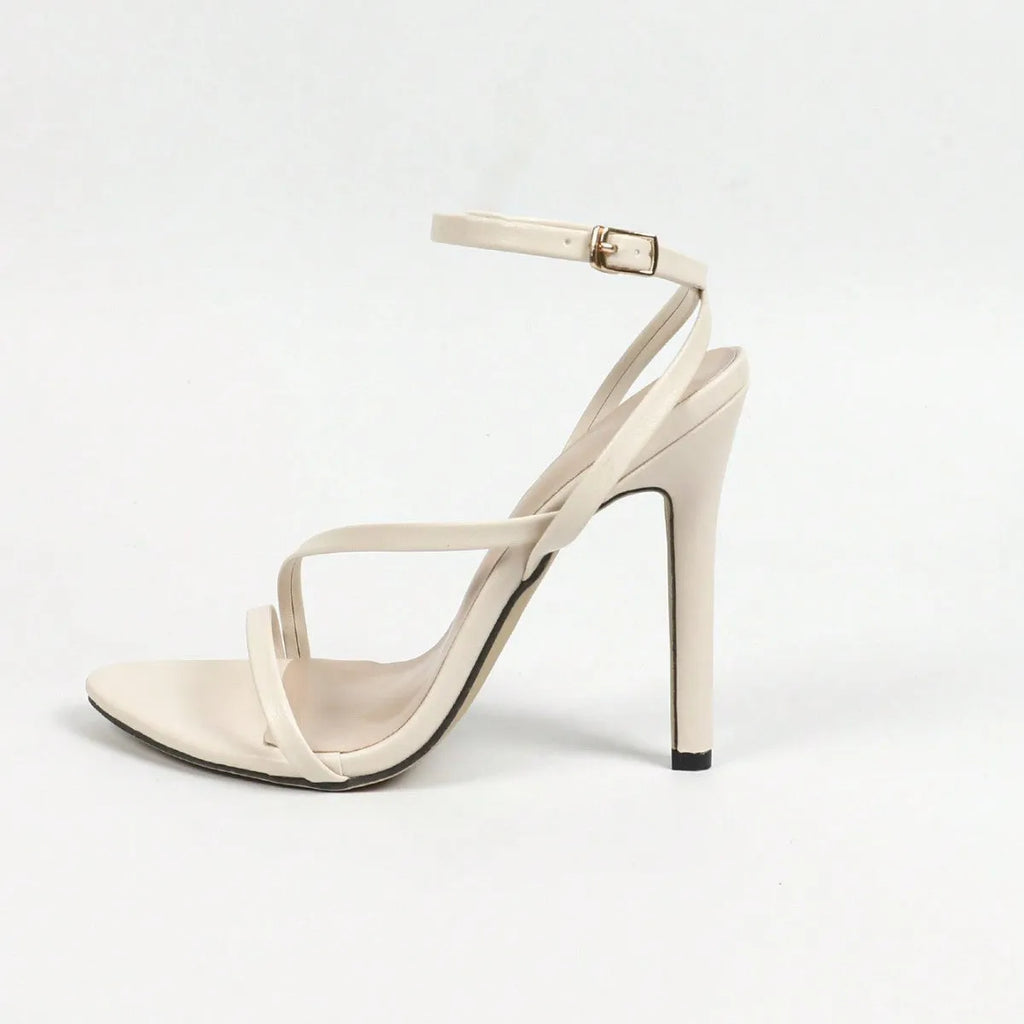 Women's gold high heel sandal with round toe, open toe design and cross ankle strap