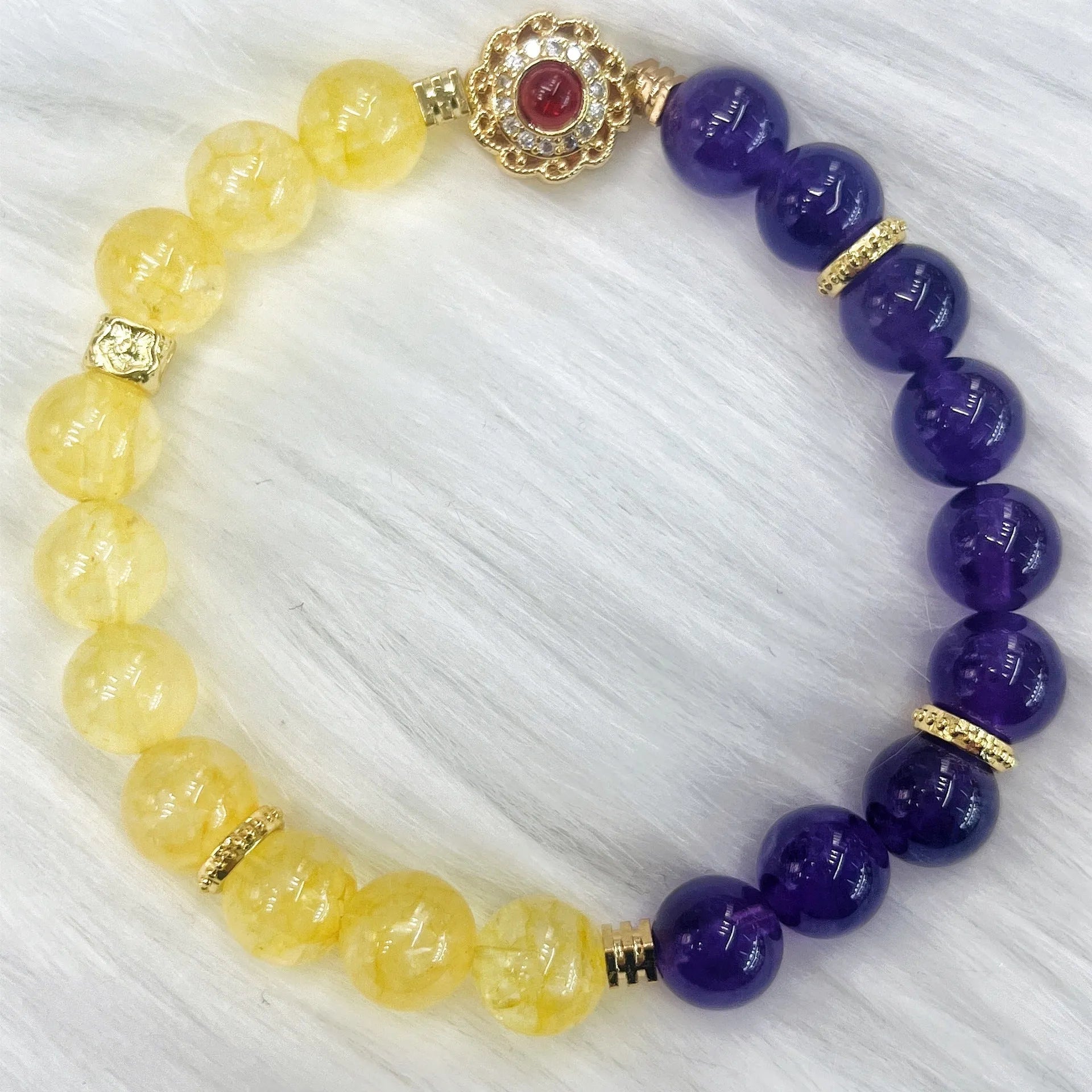 Handmade women's amethyst crystal bracelet with yellow and purple colour tones