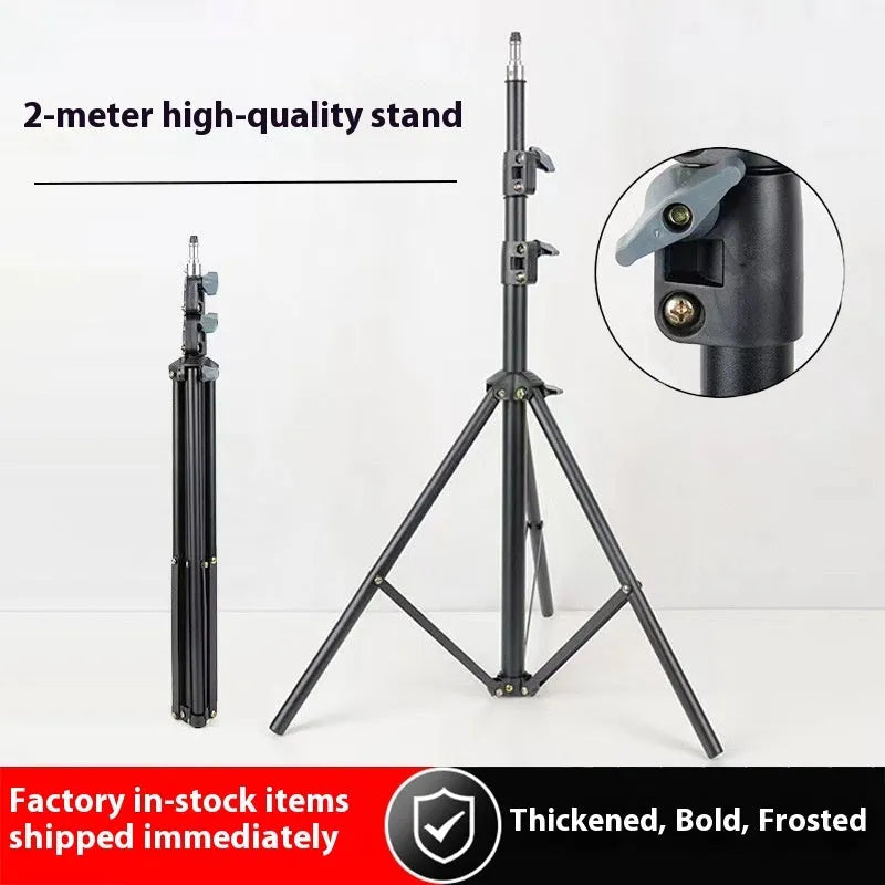 2.1m frosted carbon steel tripod light stand with mobile phone holder on floor