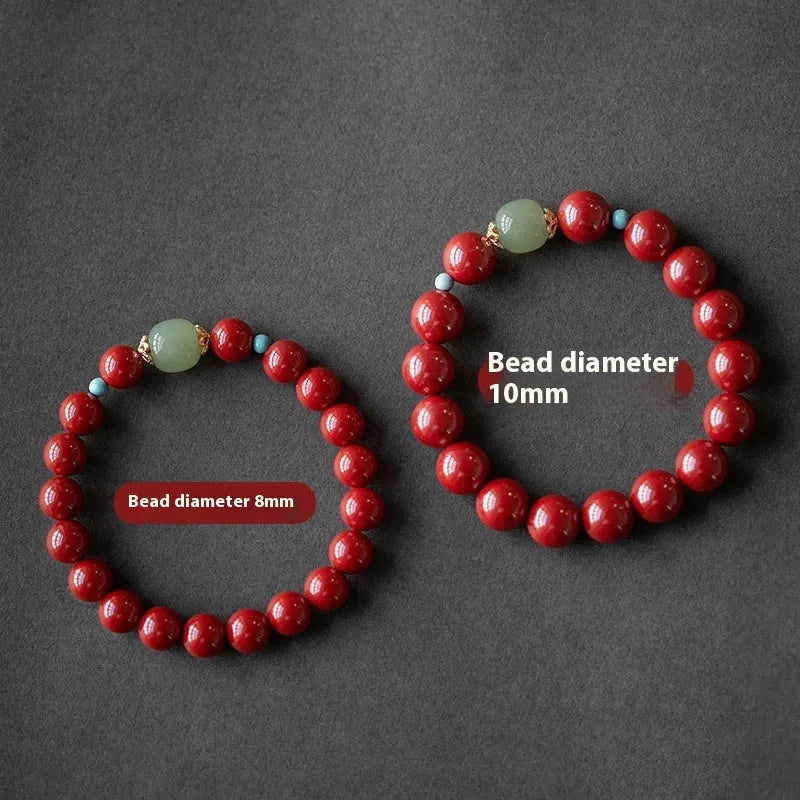 Purple Gold Sand cinnabar bracelet with geometric ellipse beads in 6mm, 8mm, or 10mm sizes on a wrist.