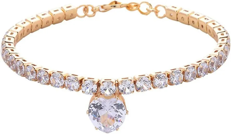 Gold rhinestone heart-shaped decorative collar for a cat or dog on a white background.
