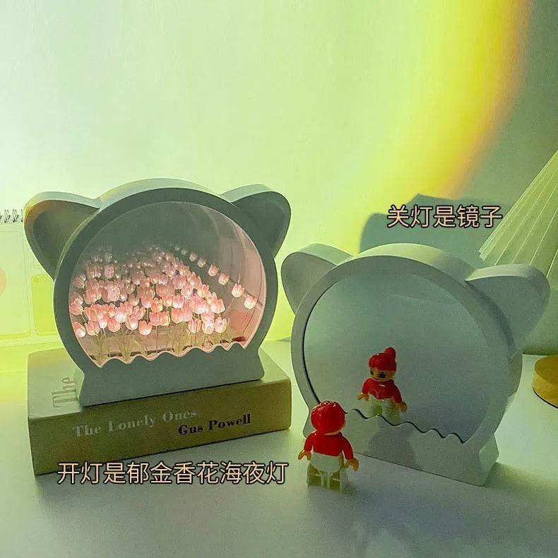 Handmade DIY cat head night lamp surrounded by colourful tulip flowers