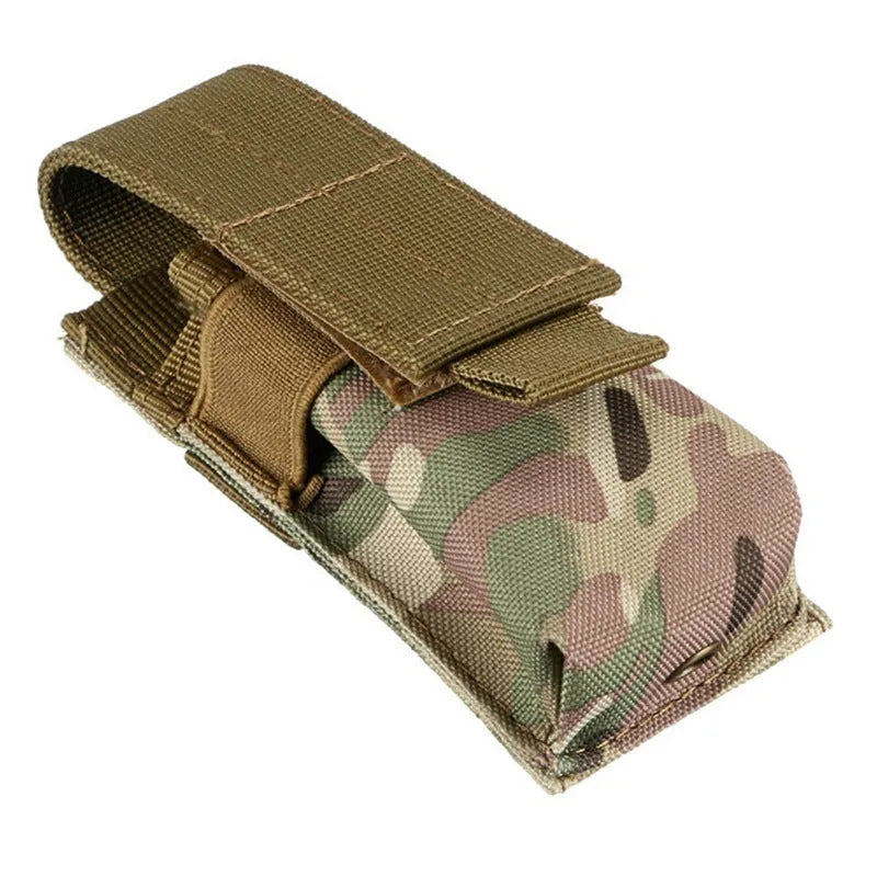 MOLLE-compatible tactical waist bag in black nylon with elastic cord buckle, shown on a belt.