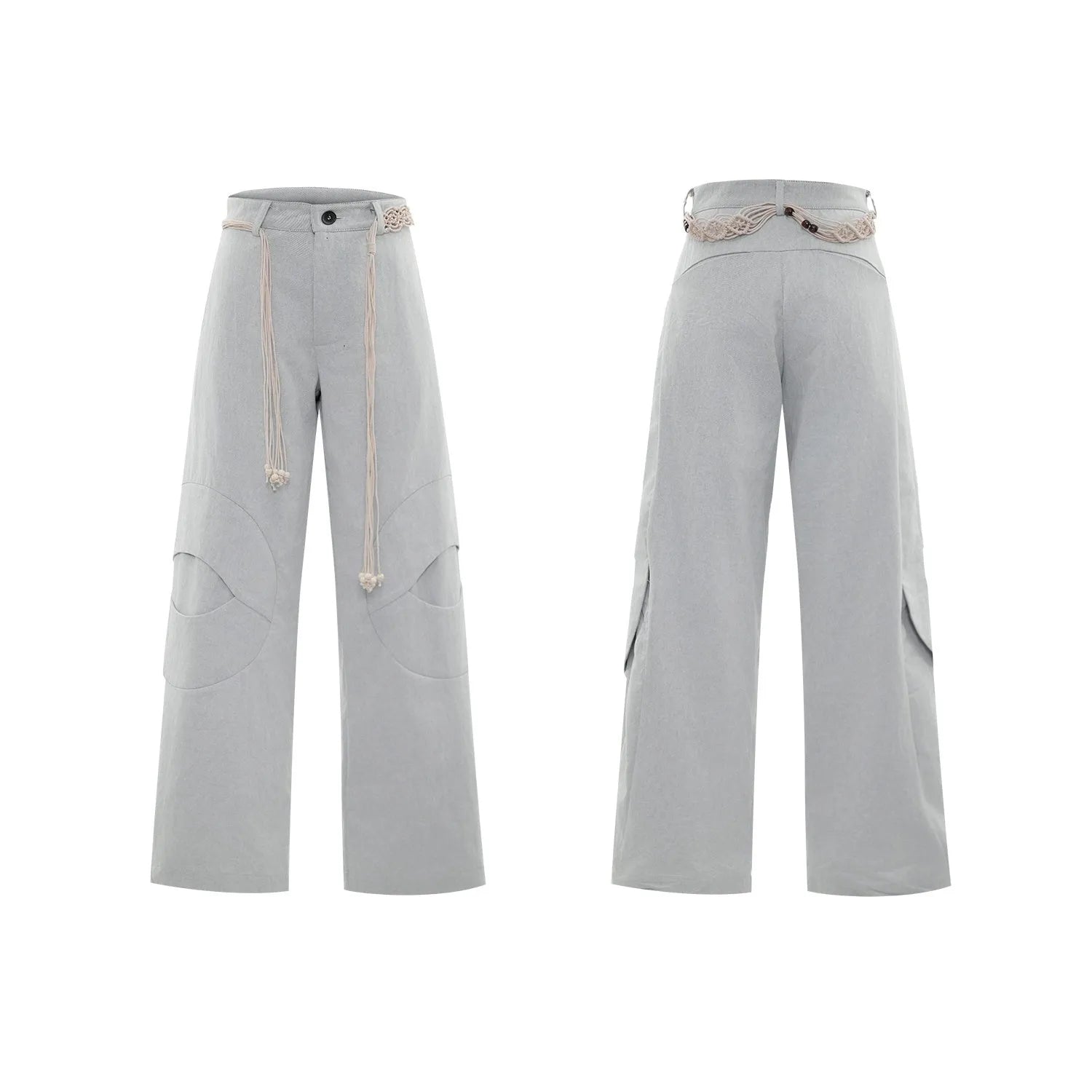Men's dark blue loose fit straight-leg trousers showing 3D cutting, belt stitching, and tassel details on pockets and zipper.