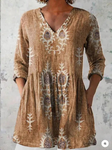 Women's printed loose dress with 3/4 sleeves and a wave skirt, shown in a variety of pattern styles.
