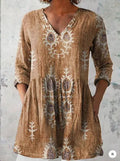 Women's printed loose dress with 3/4 sleeves and a wave skirt, shown in a variety of pattern styles.