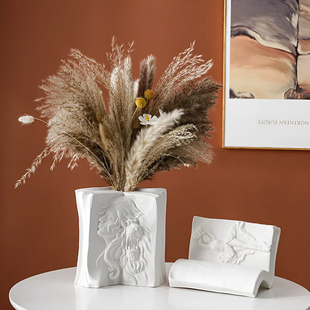A glazed ceramic book stand in a modern design, holding a book upright on a desk.