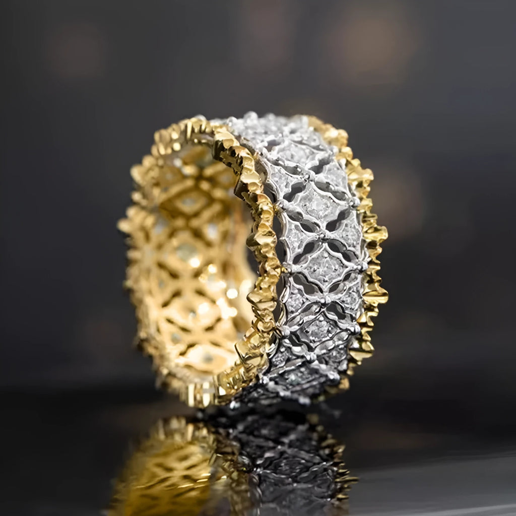 Two-tone gold colour geometric ring with a round zircon stone, showing front detail