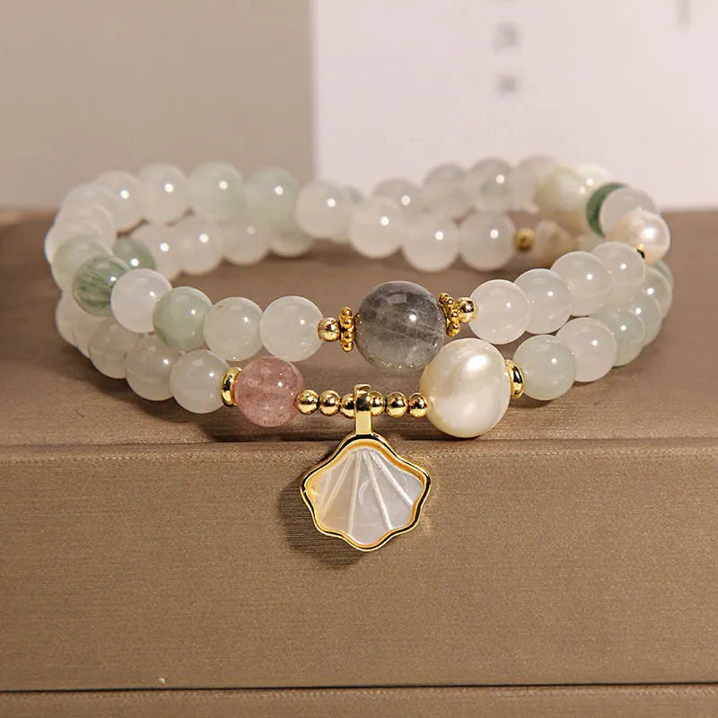 Women's crystal bracelet with gold-plated Tianshan jade shell ginkgo leaf pendant and rhinestone accents