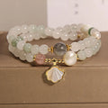 Women's crystal bracelet with gold-plated Tianshan jade shell ginkgo leaf pendant and rhinestone accents