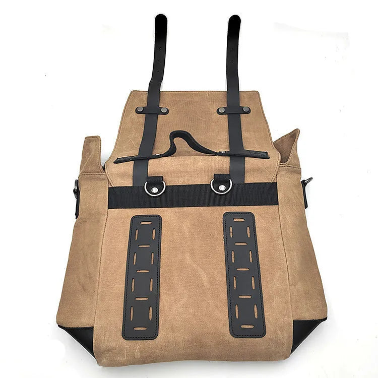 Thick waterproof canvas motorcycle side bag in black with cowhide top and adjustable straps