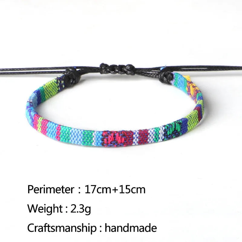 Hand woven rainbow colour bohemian style cloth anklet on a neutral background