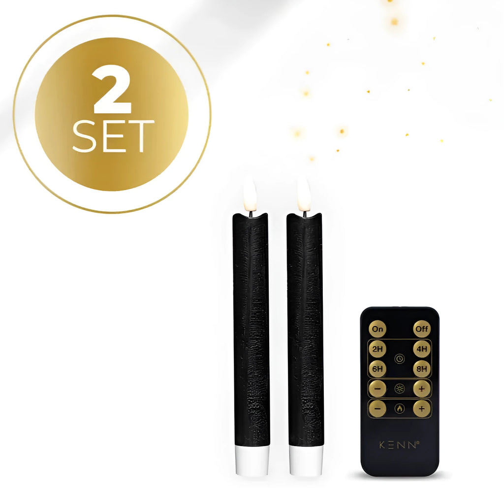 Set of four black LED taper candles with realistic 3D flame effect on wooden surface