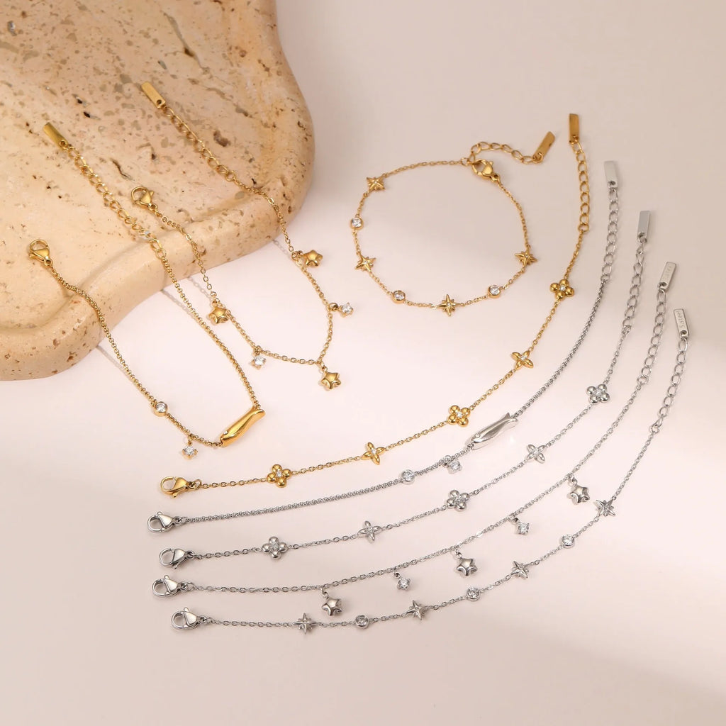 Women's stainless steel bracelet with 18K gold plating and geometric star zircon pendant