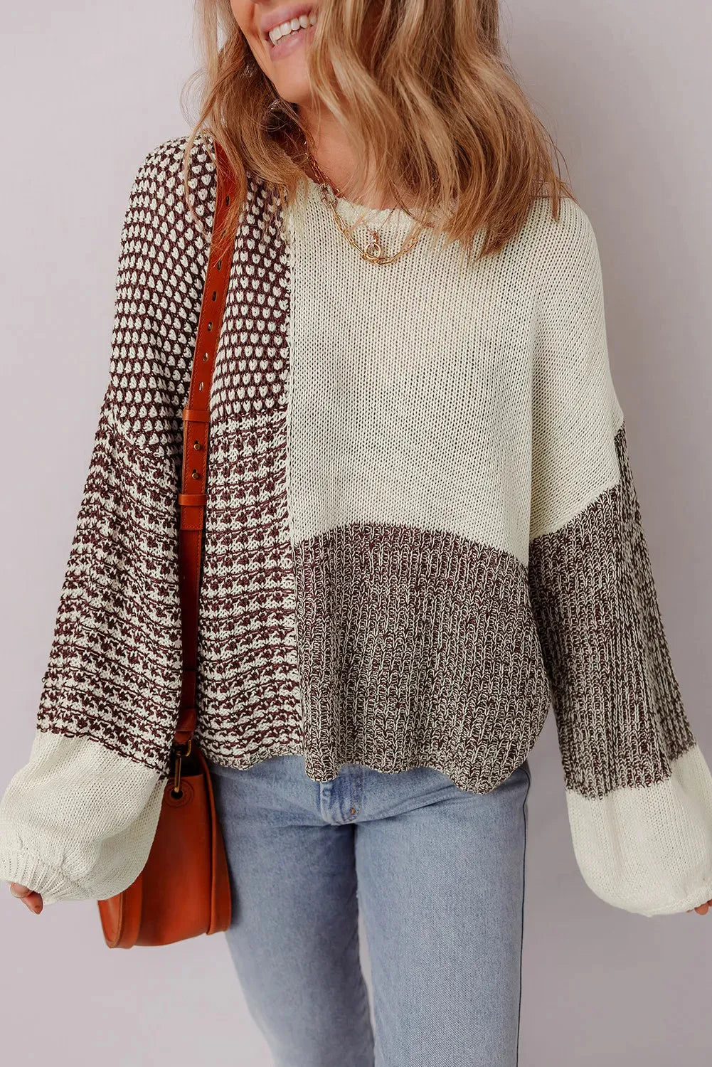 Dark khaki loose fit sweater with drop shoulders and a colour block back tie detail.