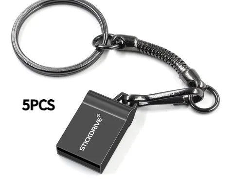 Metal USB flash drive on a keychain ring, shown in black and silver variants with decorative chain attachments.