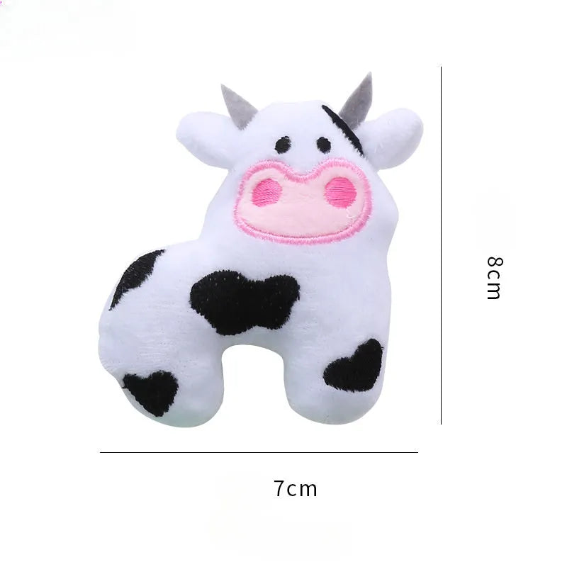 Plush cat toy shaped like a cow with catnip filling for feline play