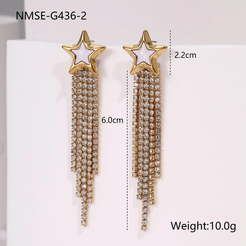 A pair of gold electroplated stainless steel earrings featuring geometric heart and five-pointed star shapes in a dangle style.
