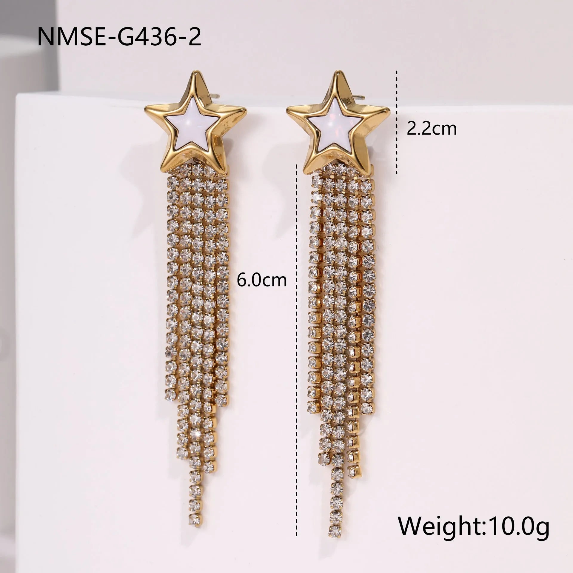 A pair of gold electroplated stainless steel earrings featuring geometric heart and five-pointed star shapes in a dangle style.