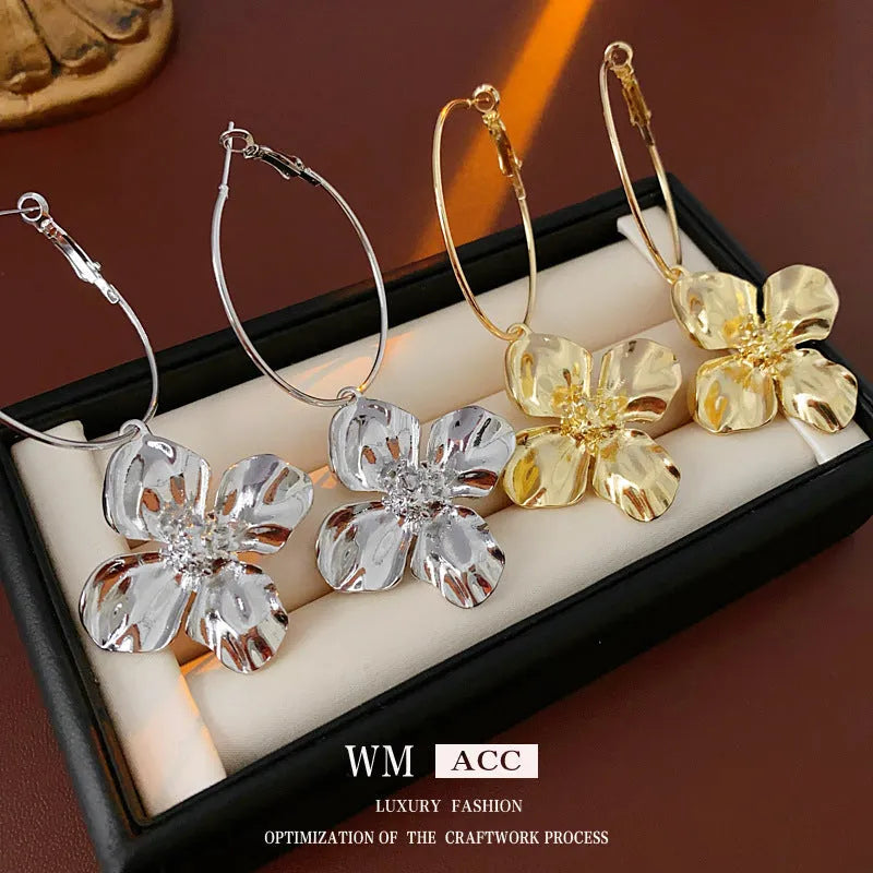 Silver needle drop metal flower earrings with geometric vintage design in gold and silver electroplated finishes
