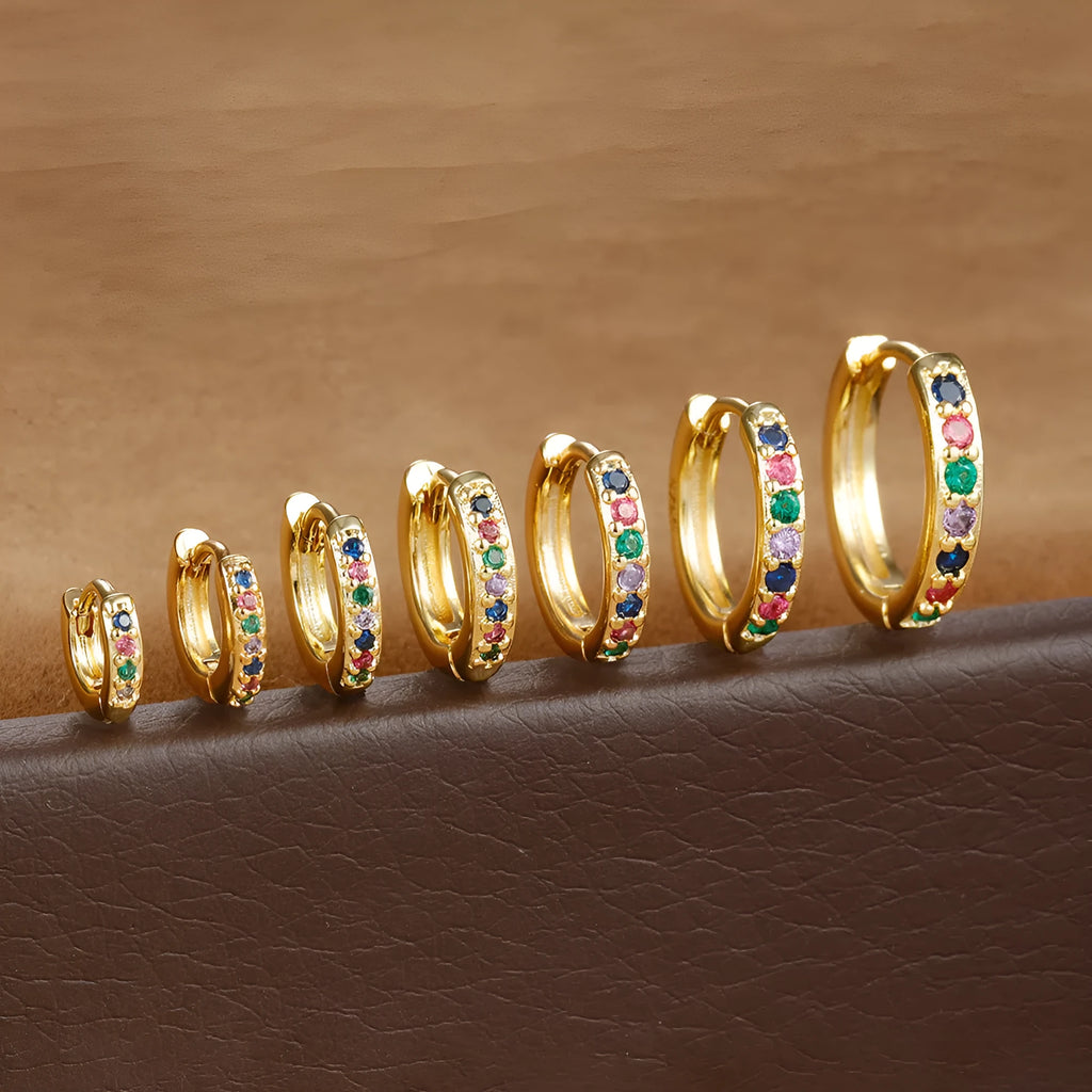 Circle zircon perforated stud earrings showing gold, rose gold and silver colour options with different diameter sizes