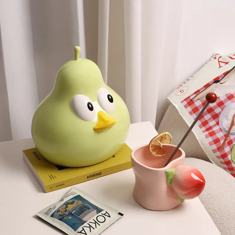 White ceramic pear-shaped tissue box holder in green colour option