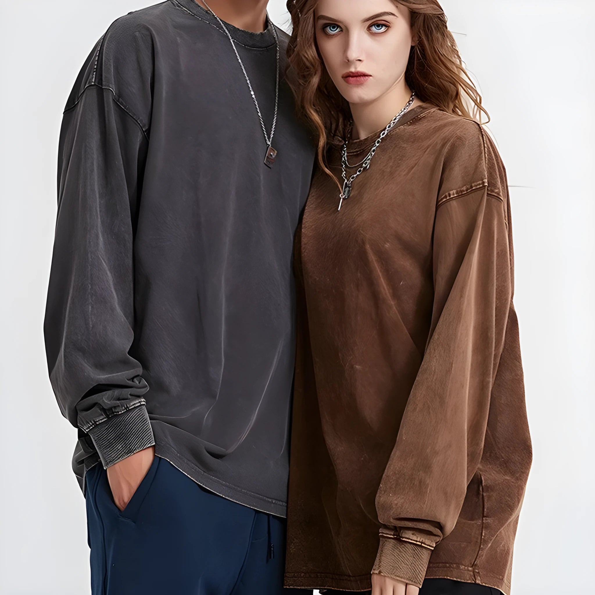 Man wearing a vintage washed loose fit cotton pullover in a batik colour, long sleeves.