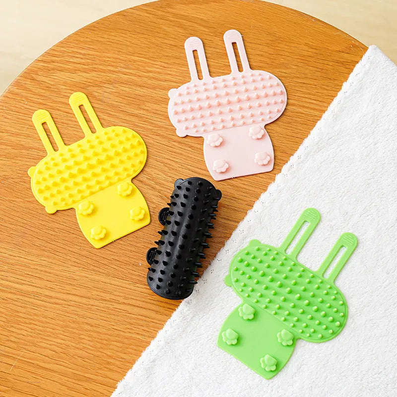 Silicone cat grooming brush with adjustable strap and rounded comb teeth in four colour options