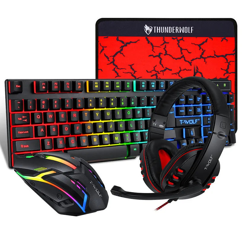 Wired gaming keyboard and mouse set with headset and mouse pad arranged on desk
