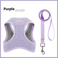 Brown cloth cat harness with chest strap and hand holding rope showing waffle texture pattern