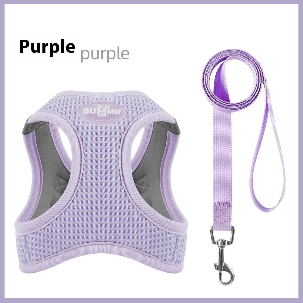 Brown cloth cat harness with chest strap and hand holding rope showing waffle texture pattern