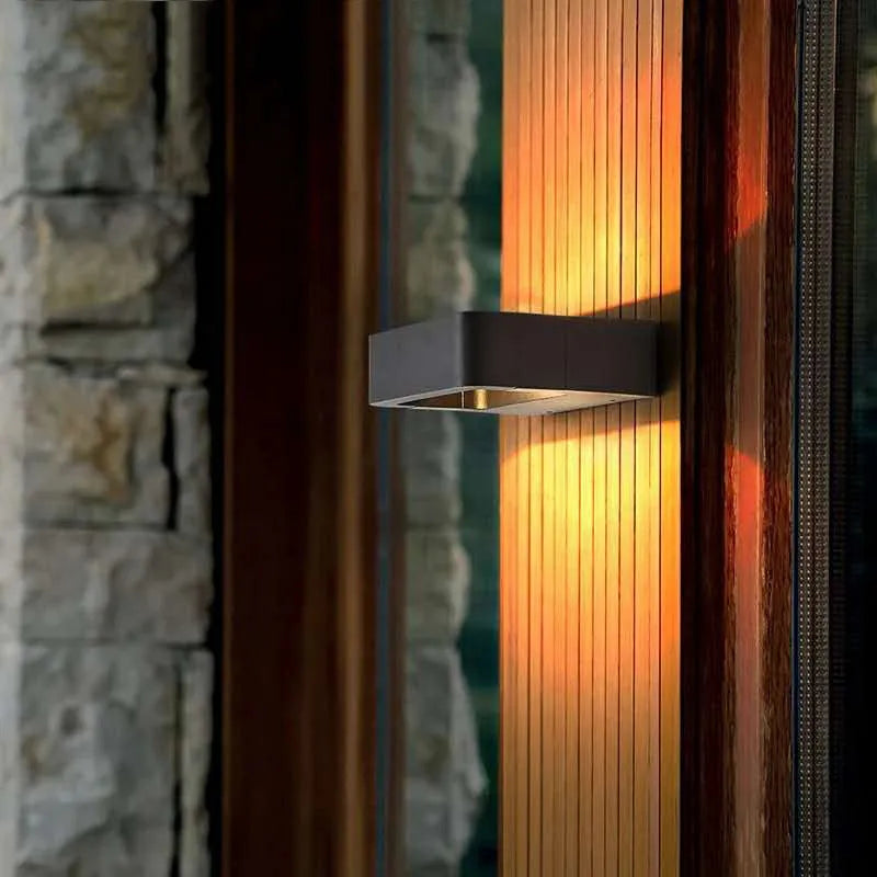 Aluminium outdoor wall lamp with warm white light for use at courtyard gate or exterior corridor, IP65 rated
