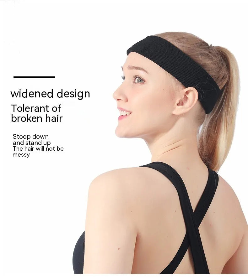 Elastic solid colour sports sweatband in black, shown on a white background.