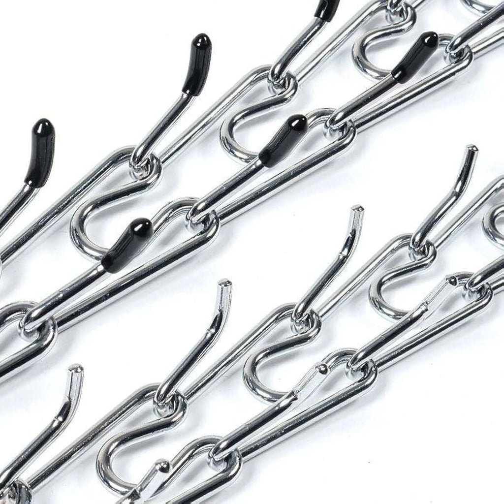 Stainless steel dog prong training collar with rubber tips on adjustable metal links.