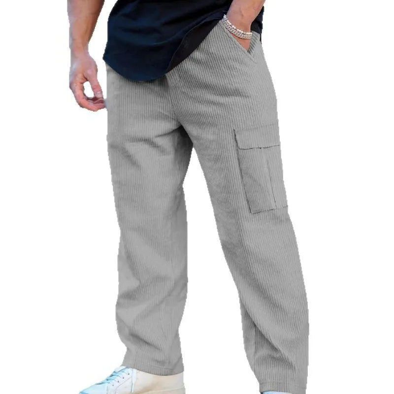 Men's straight leg corduroy cargo trousers in army green with a drawstring waist and loose wide-leg fit.