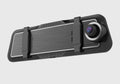 Black dual-lens driving recorder with a large touch screen mounted on a car windscreen.