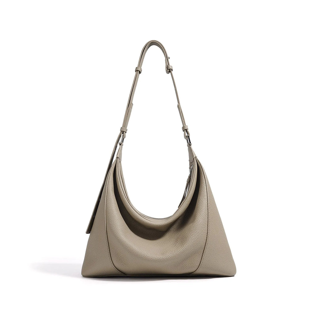 First layer cowhide soft leather shoulder bag in beige with pillow shape and open outer pocket