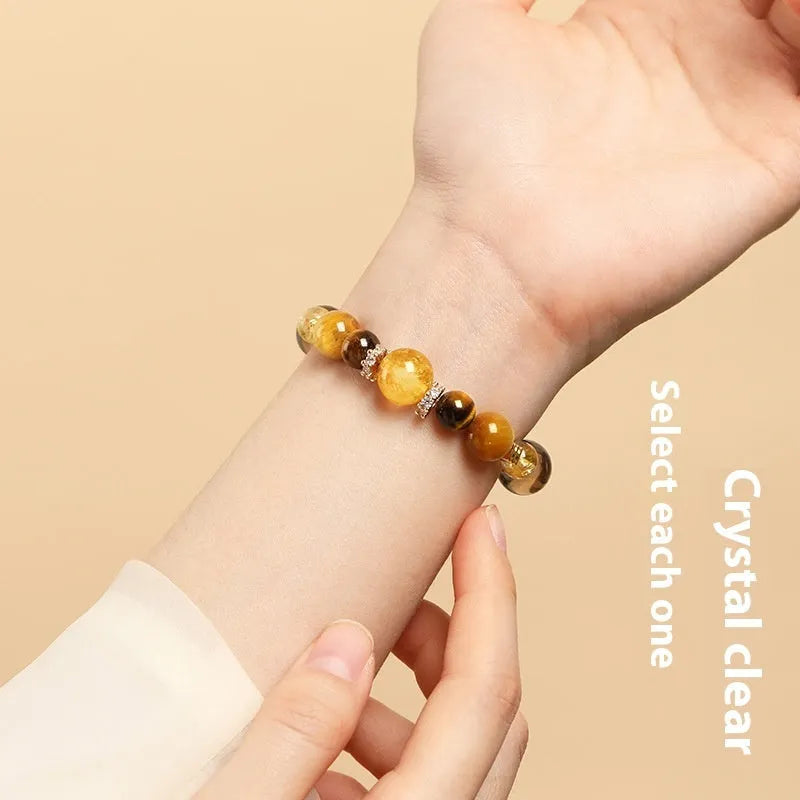 Geometric yellow crystal tiger-eye bracelet showing 10mm and 12mm size options