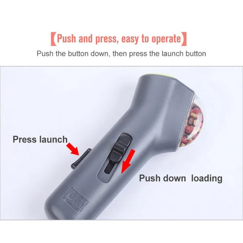 Grey dog treat catapult launcher measuring 18cm with spring trigger for 3 metre snack ejection