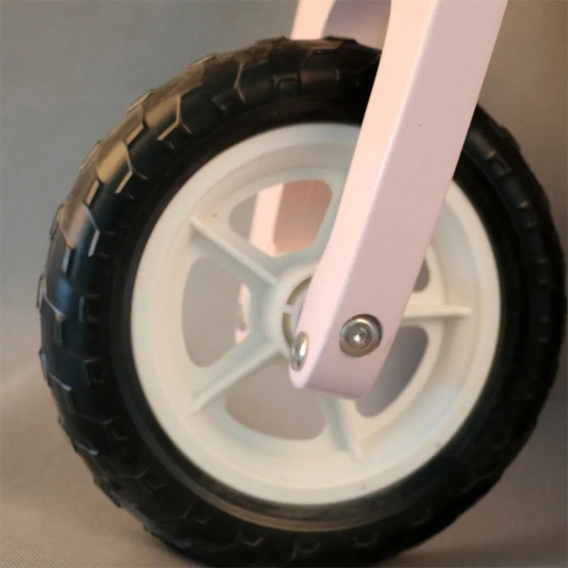 Pink wooden balance scooter for toddlers with 10-inch size for ages 1-6 years
