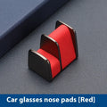 Green zinc alloy and leather glasses clip holder for car dashboard.