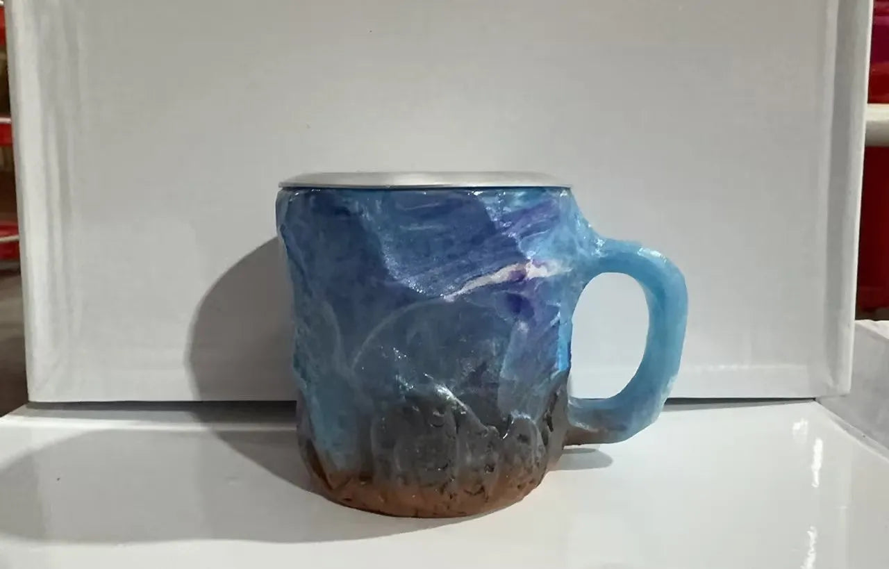 400ml resin coffee mug with handle in a choice of colours including blue, purple, and rock pattern.