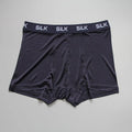 Men's silk shorts in loose fit design showing navy blue, silver grey, and skin colour options