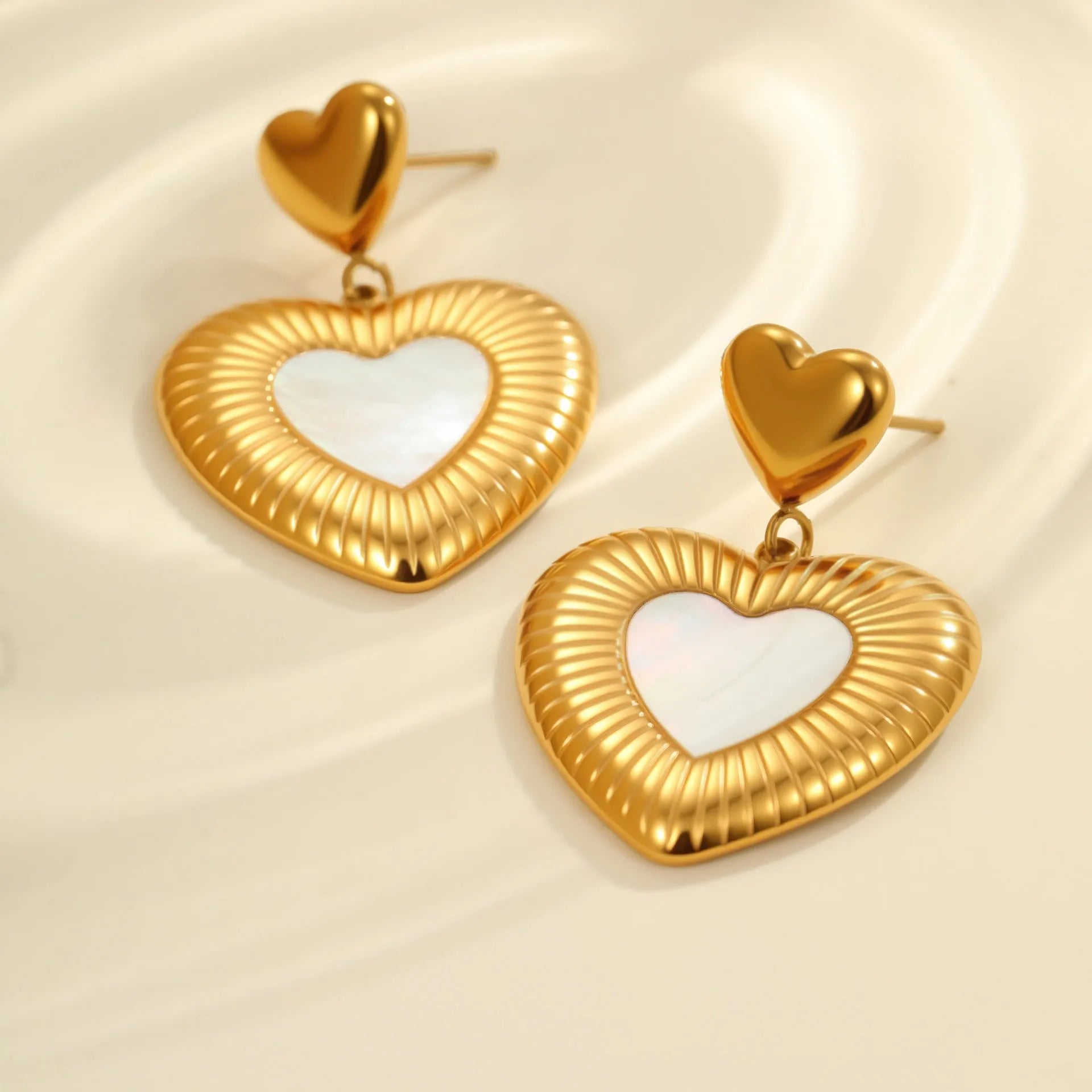 Gold electroplated stainless steel heart earrings with white fritillary pattern