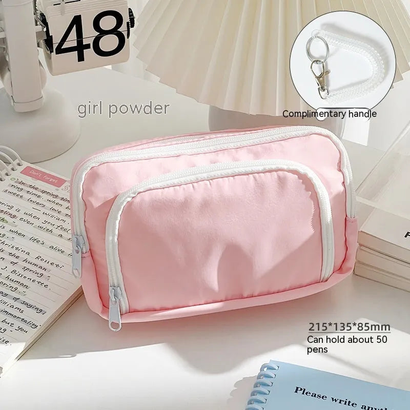 Double-layer pencil case in blue with gift handle, showing high-capacity storage for exam stationery